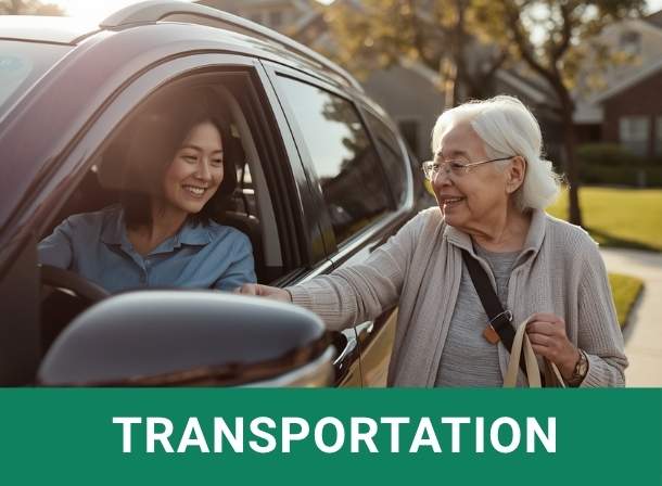 Older woman standing next to the car with younger woman driver